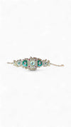 Emerald Green and Ruby Red CZ Open-Work Watch for Women, side view, Cunei India