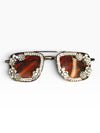 Brown tint crystal glares on model, Cunei India