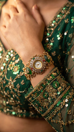Gold with Green and Red Accents Kundan Ethnic Bracelet Watch side view, Cunei India