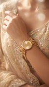 Gold with Red and Green Accents Pearl Ethnic Bracelet Watch side view, Cunei India