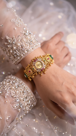 Gold Shield Ruby Bracelet Watch product photo, Cunei India