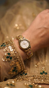 Gold with White Dial, Green, Red, and Pink Accents Pearl Ethnic Wrist Watch side view, Cunei India