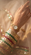 Gold with White Dial, Green, Red, and Pink Accents Pearl Ethnic Wrist Watch product photo, Cunei India