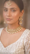 Gold and White Kundan Pearl Drop Necklace Set side view, Cunei India
