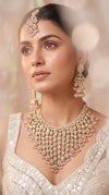 Pink and Clear Multi Strand Kundan Drops Necklace Set side view, Cunei India