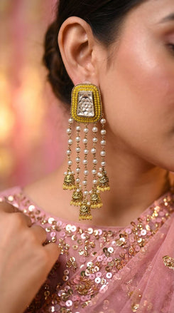 Yellow pearl jhumkas detail, Cunei India